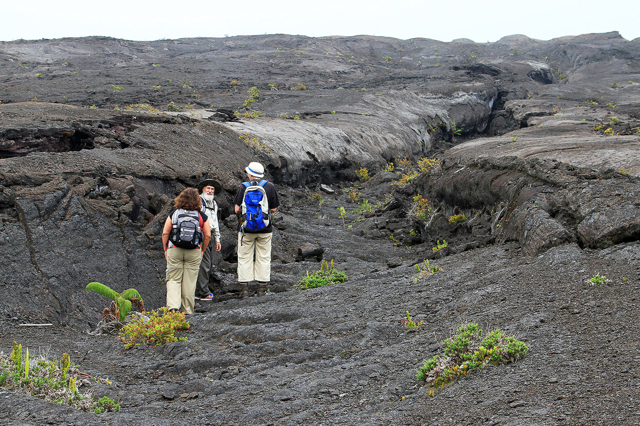 Walking on lava fields up to old crater rim.