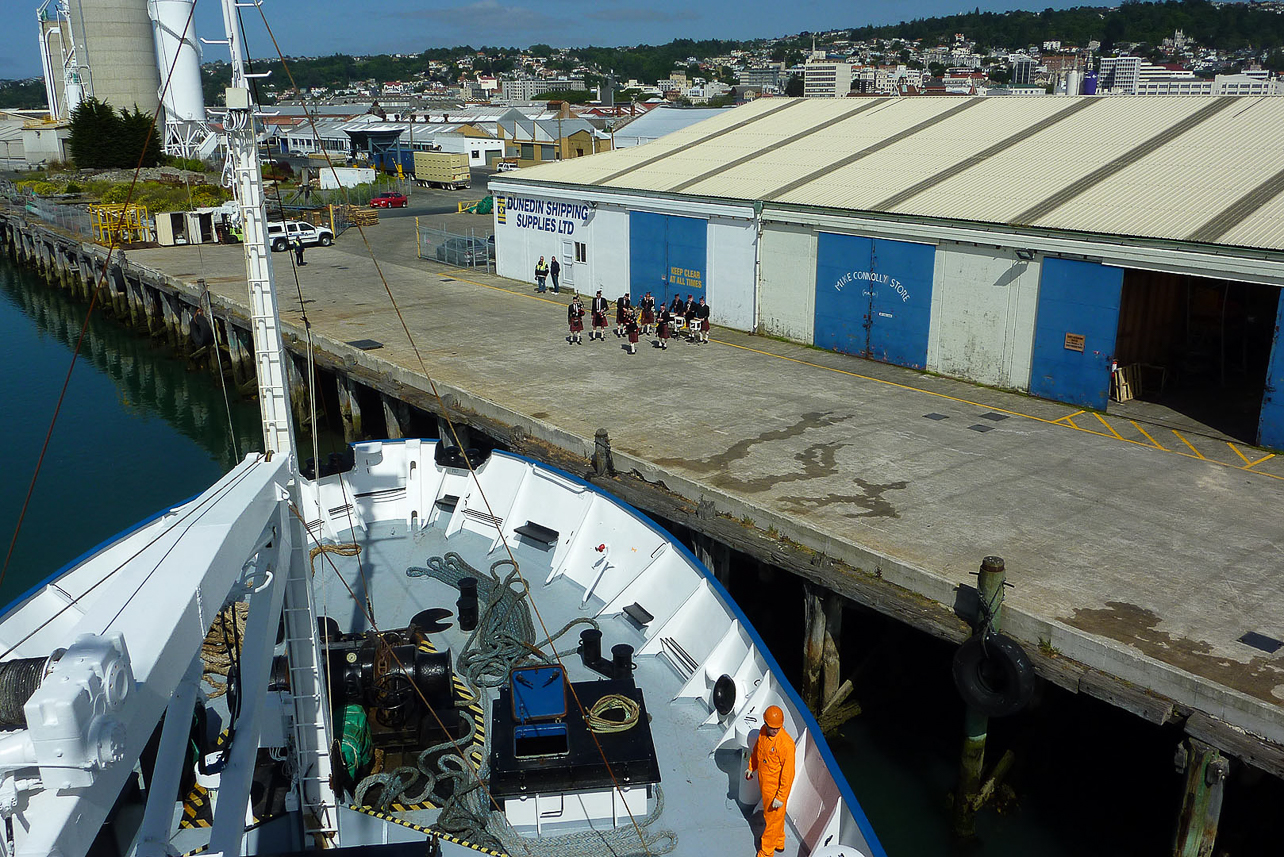 Departure from Dunedin, accompanied by bag pipes