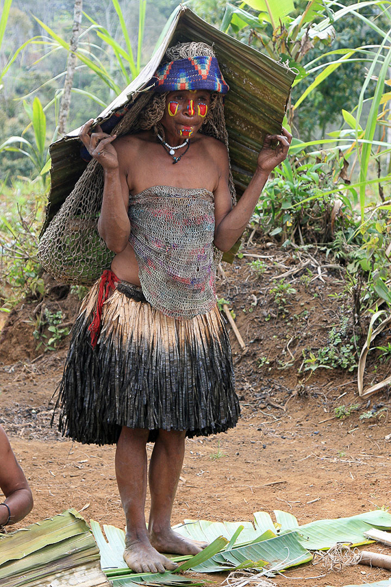 Umbrella (and mat) of pandanus leaves