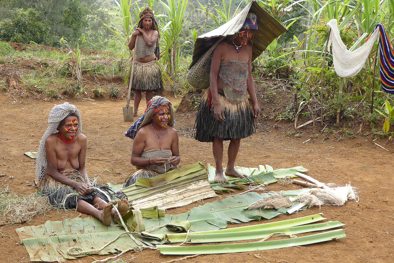 Demonstrating women's work at the village