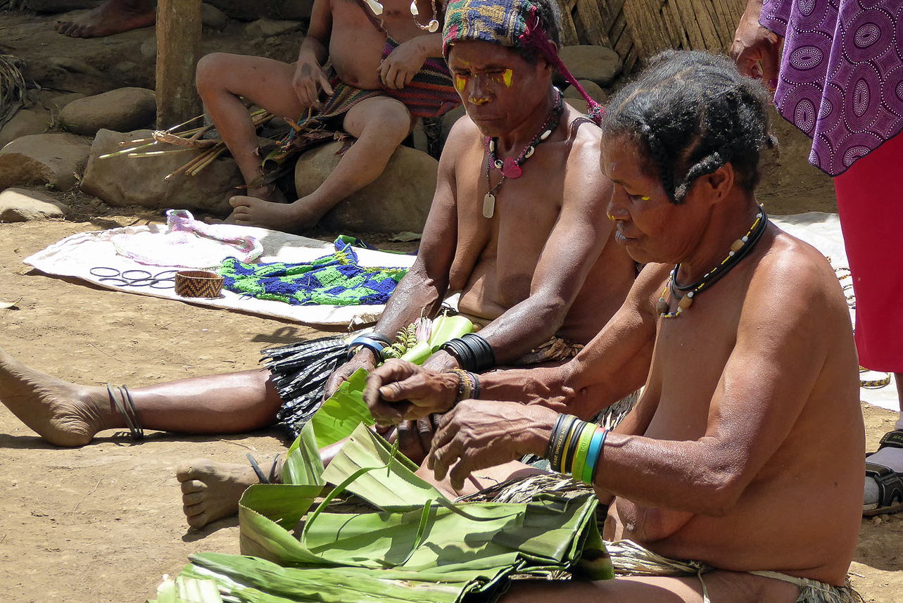 Women's work at this village. A magic woman could get his man to obey her, or get divorced without the man's family requiring the pigs from the bride gift back.