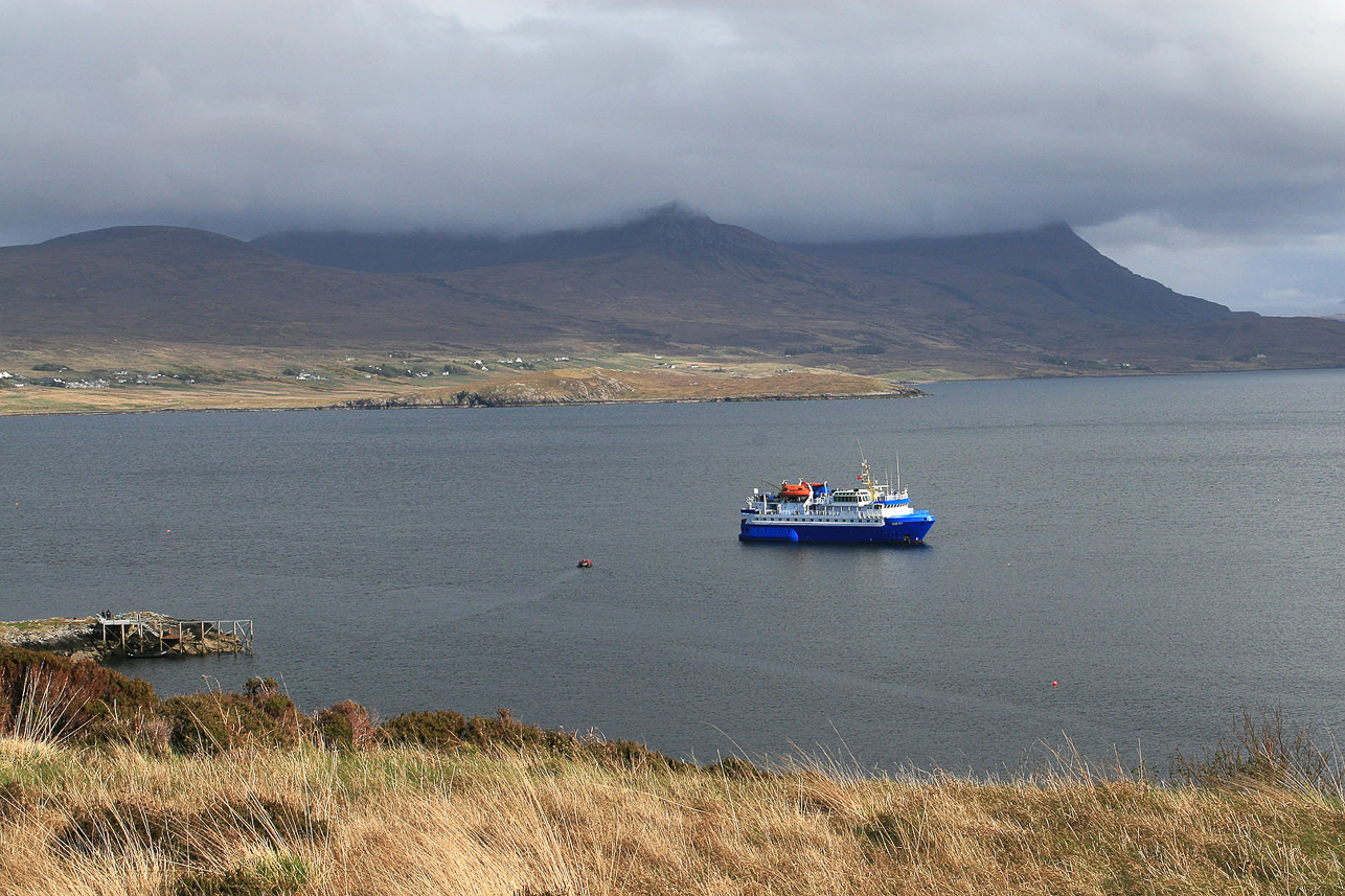 Our ship at Tanera Mòr, with the mountains on the main land in the back