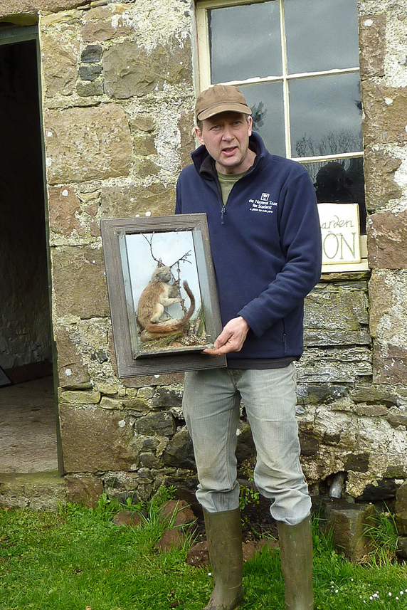 The gardener showing the restored garden (and other things) of the Canna House