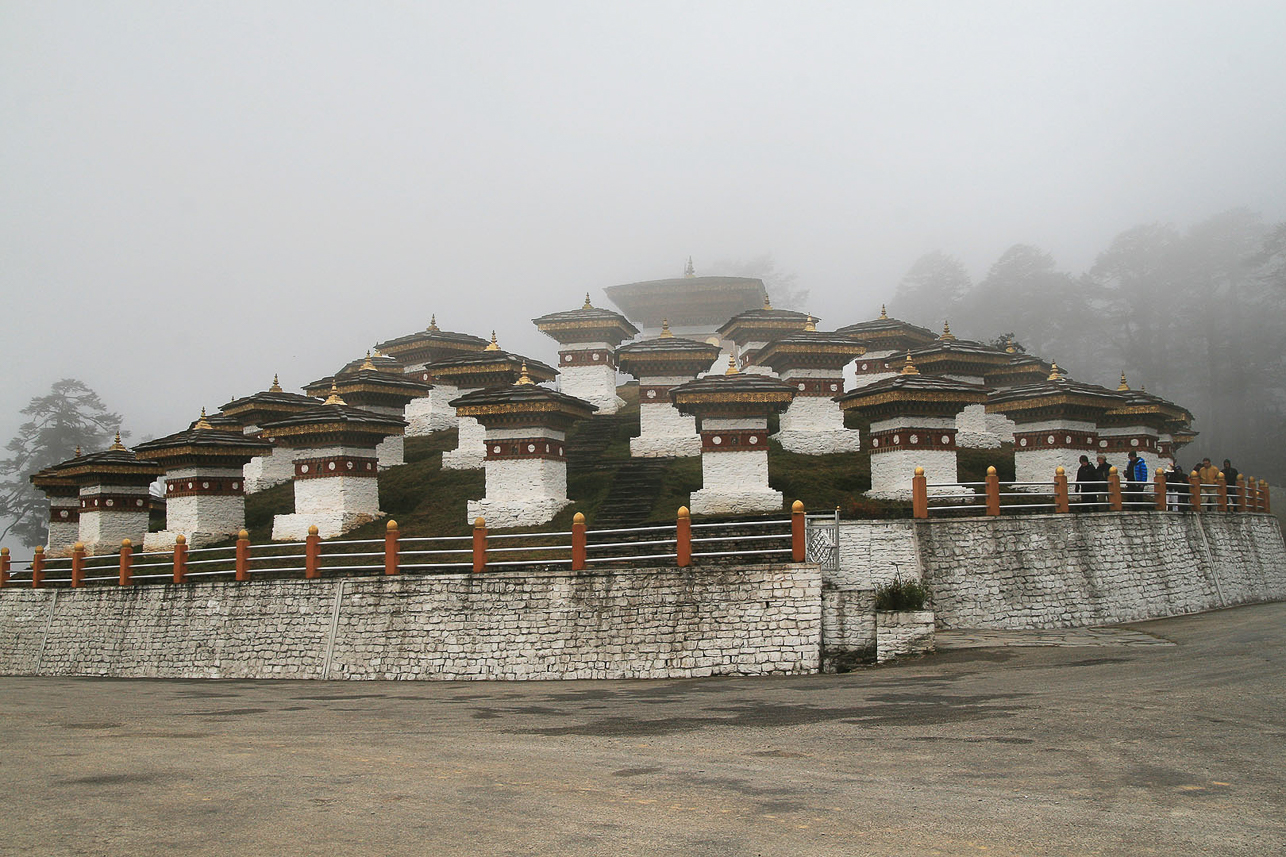 Dochula Pass, 3100 m, (often in clouds) with 108 stupas, built 2004 by the Queen Mother to honor the 4th king and  to celebrate victory and peace.