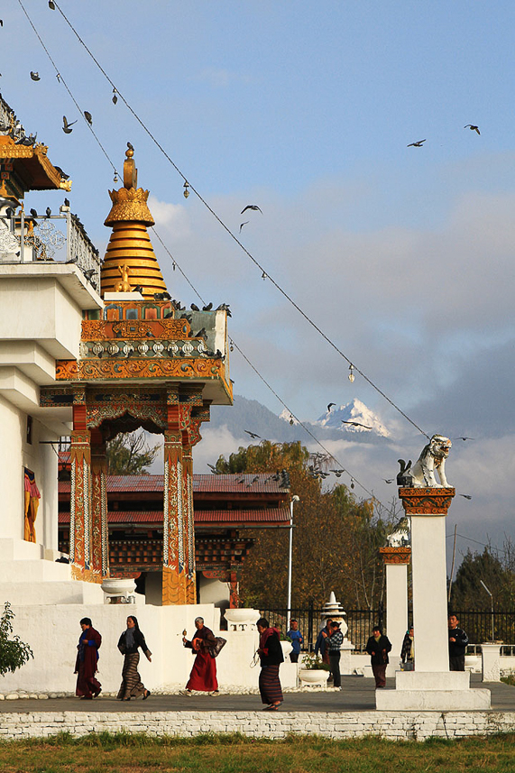 People walking the kora around the Memorial Chorten.