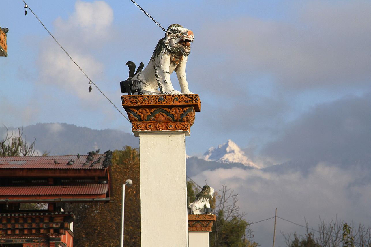 Chorten in Thimpu, statue and mountain (symbols and memories from Bhutan).