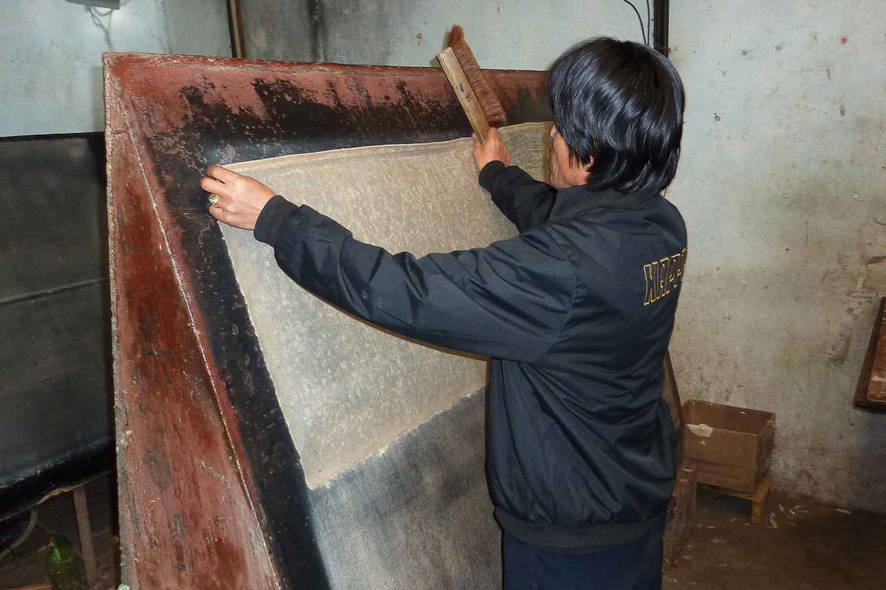 Paper factory, drying sheets.