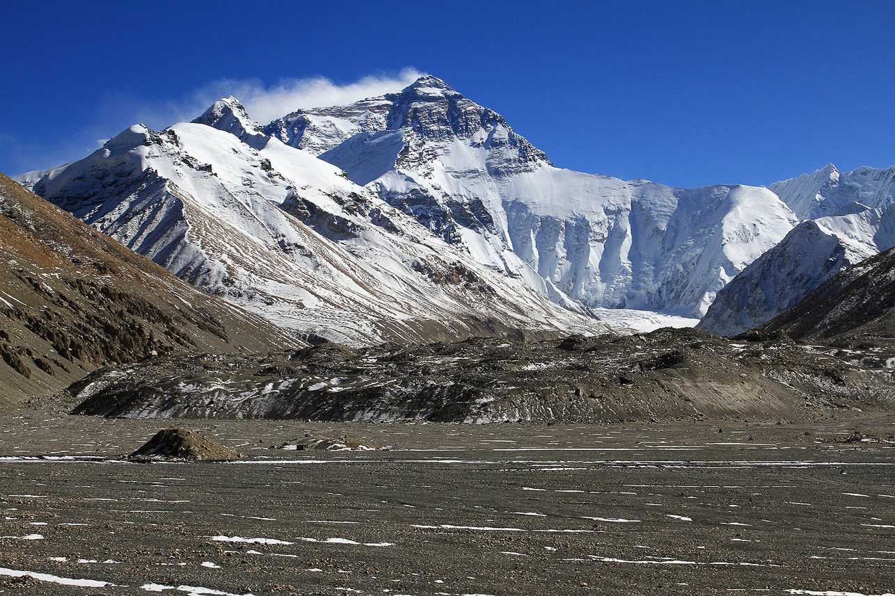 Mt Everest, 18 km away, from the Tibet base camp. The route to the top is on the left hand side.