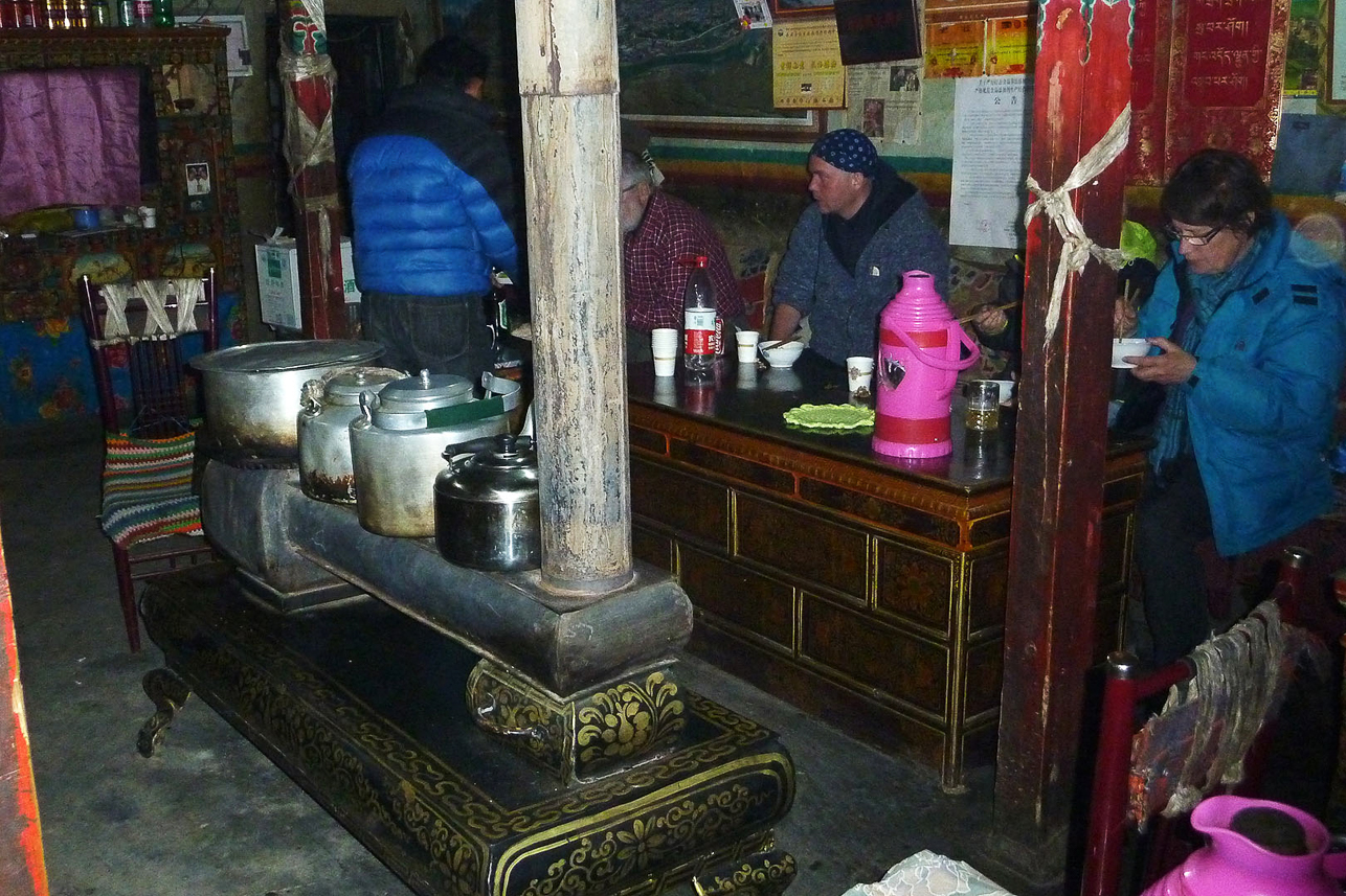 Dinner in the guest house. The stove was fired by dung.