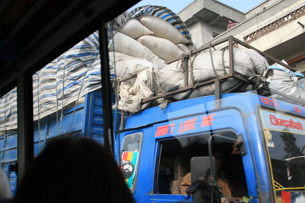 Heavily loaded lorries.