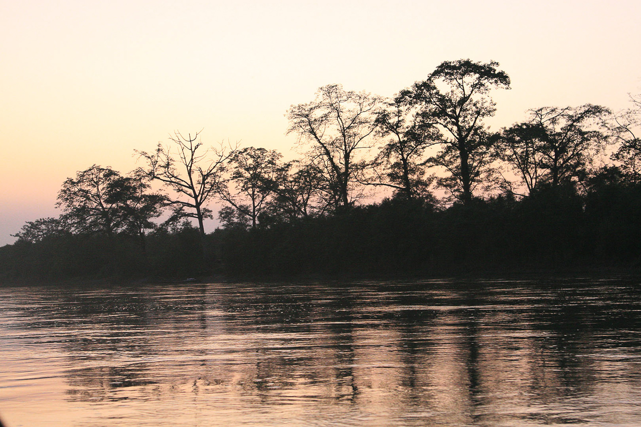 Going down the Naryani river at dusk.