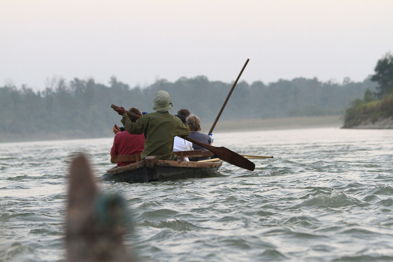 Going down the river, trying to see crocodiles (but it was too dark).