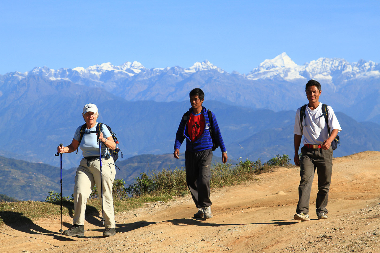 Camilla, with company, and the Himalayas