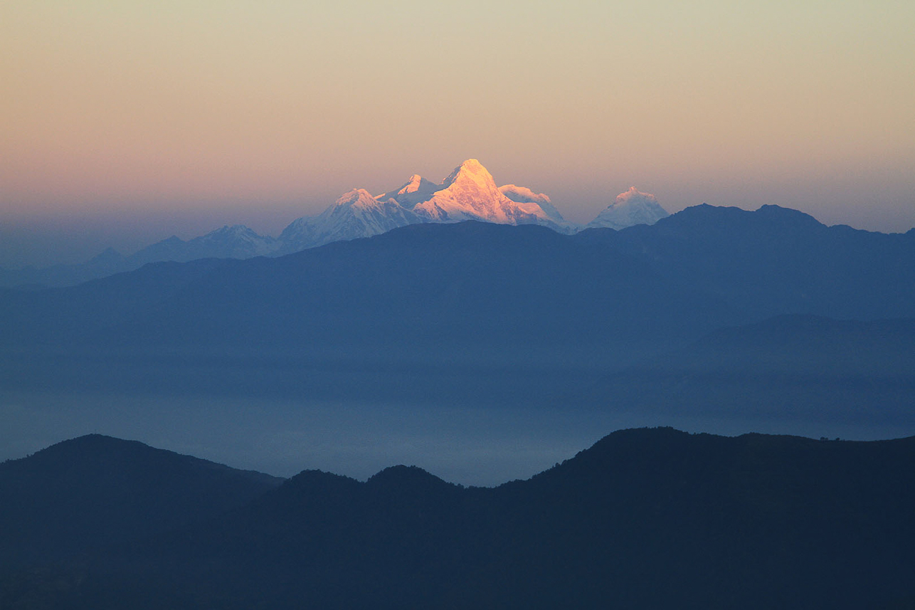 Morning sun hits the peaks.