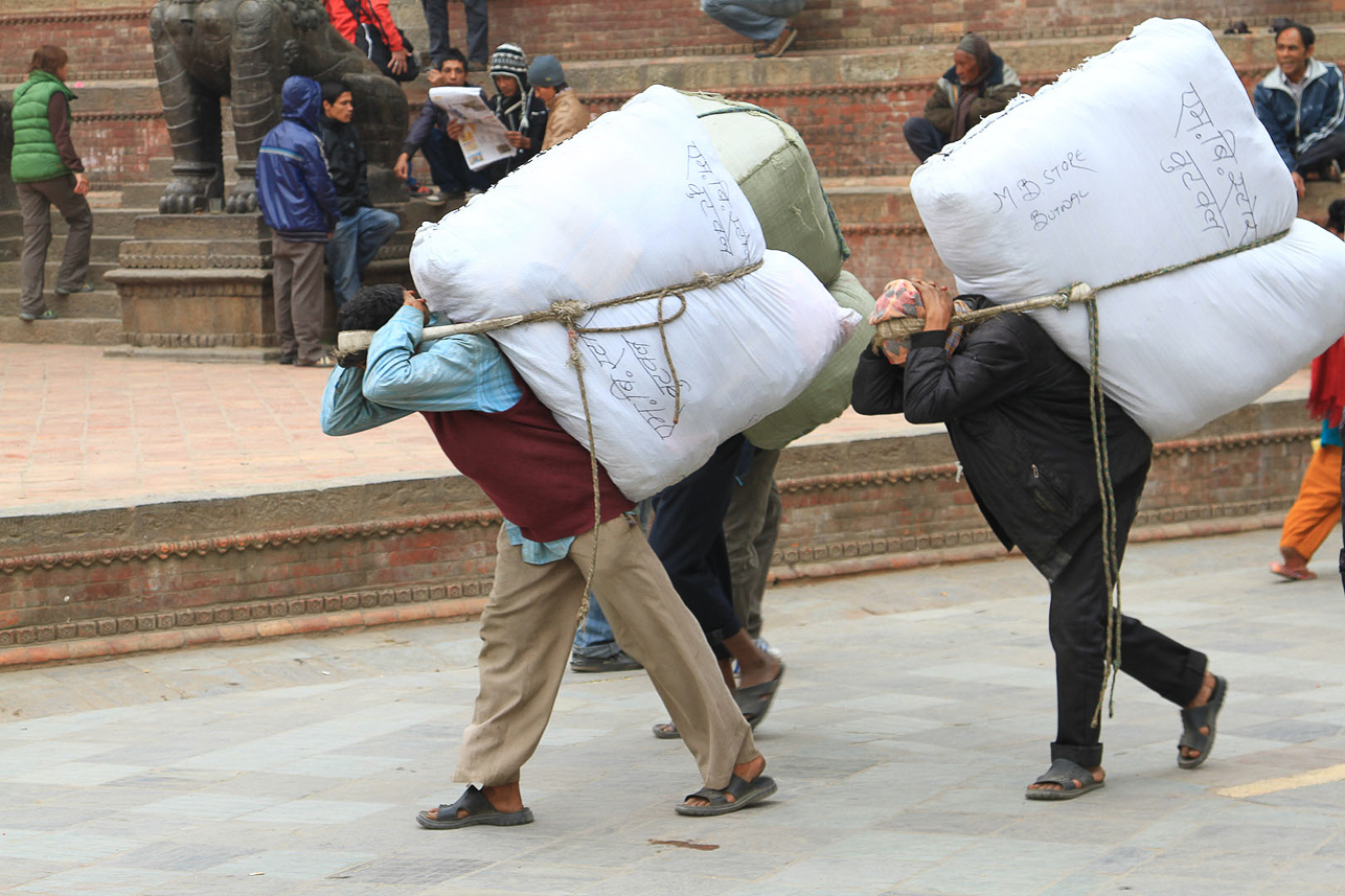 Heavy load, with the typical way of carrying things on your back.