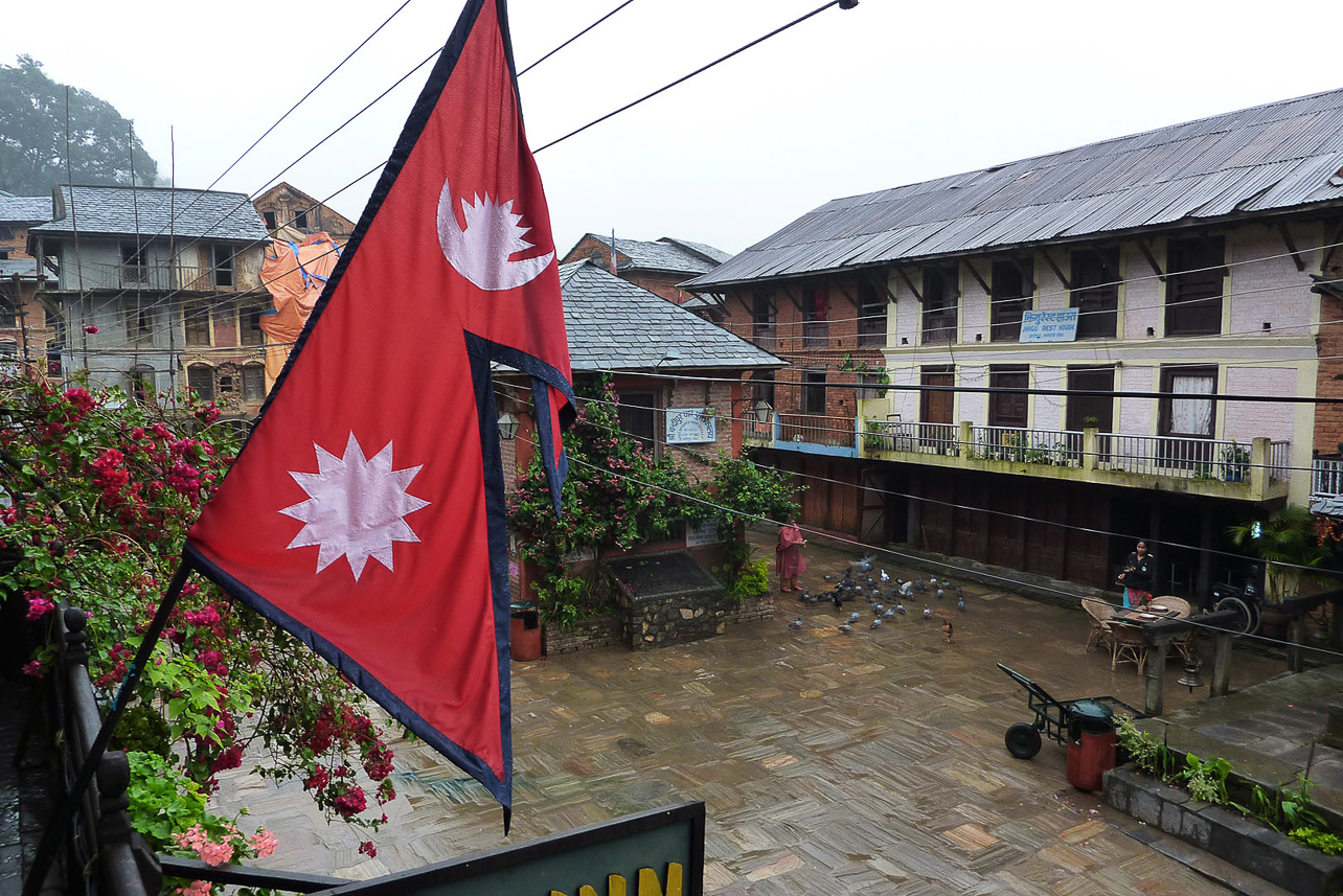 Flag of Neapl at the square in Bandipur, 140 km west of Kathmandu. (The only not rectangular flag in the world).