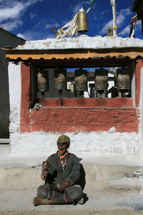 80-years old praying man at Shegar Dzong.