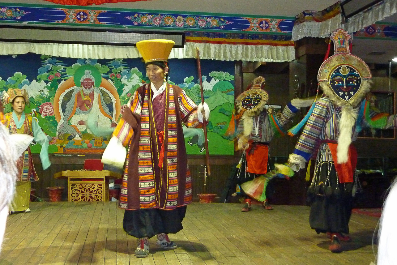 Tibetan performance, with many masks, instruments and dances.