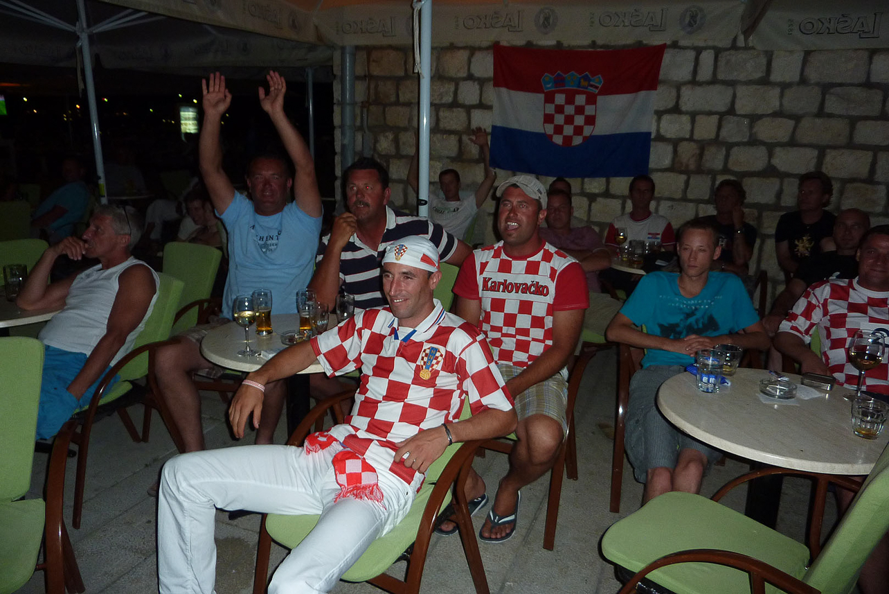 Croatian football team on large televsion screen (World Championship).