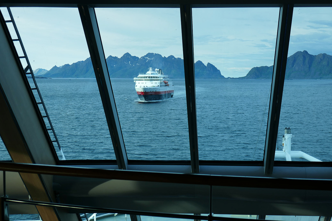 Close meeting with m/s Finnmarken outside Svolvaer. Traditional greeting with a lot of hooting takes place (but the first long hoots frightened us a little).