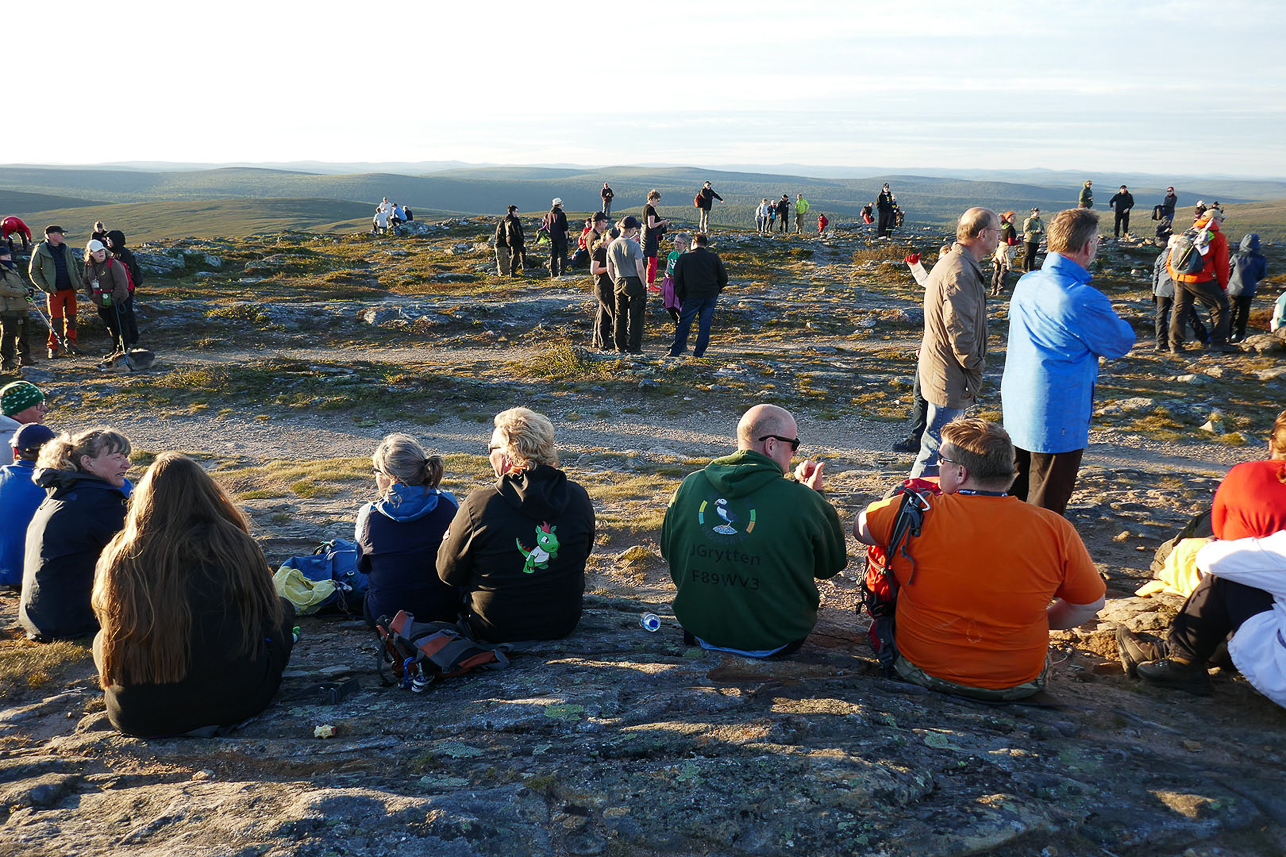 Geocaching event, on the top, waiting for the midnight sun