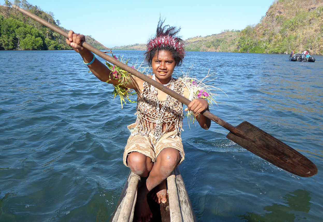 Girl, paddling our canoe on McLaren river