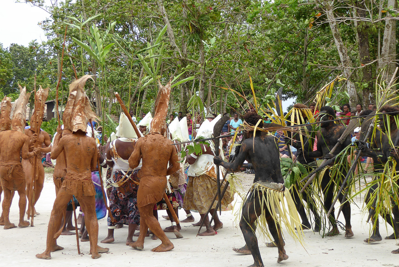 The black men are coming to save the women from the mud men intruders.