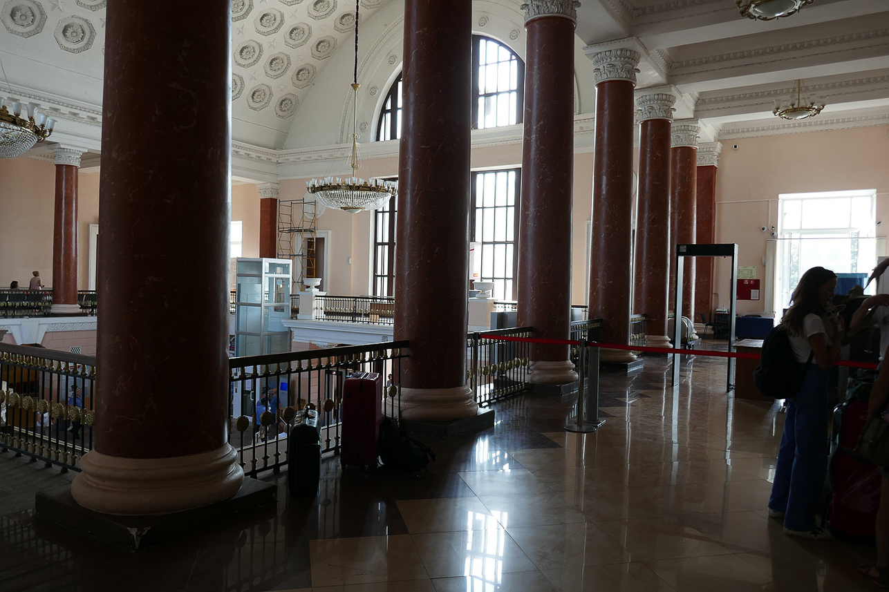 Inside the train station, a procedure to pass through to the train