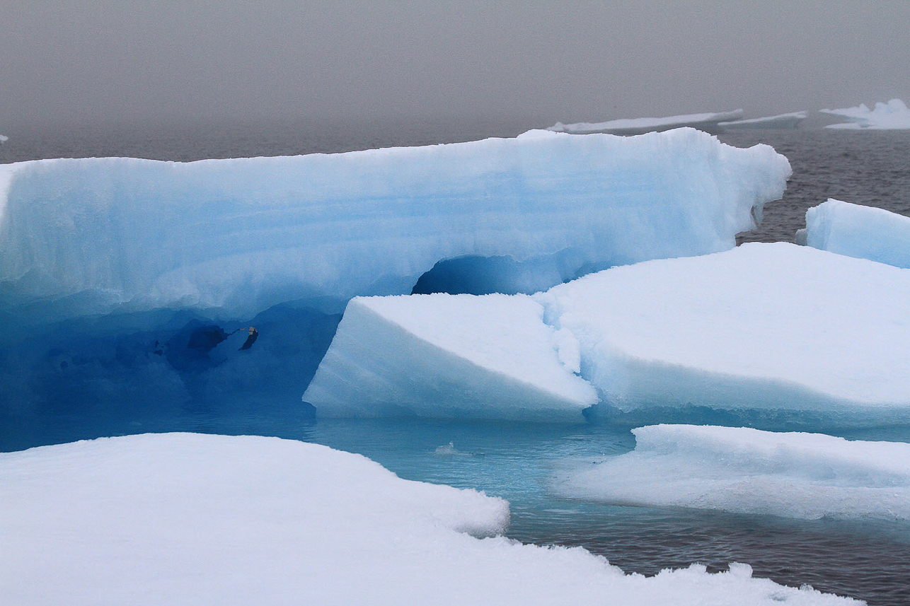 Glacier ice, blue due to lack of oxygene.